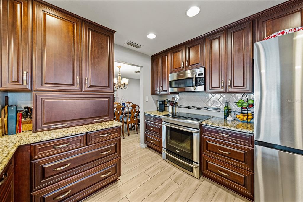 Chandelier, Interior, Kitchen, Recessed Lighting, Stainless Steel Appliances, Wood Texture Flooring
