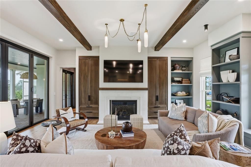 Fireplace, Interior, Living room, Pendant Lights, Recessed Lighting, Wooden Beams, Wood Texture Flooring