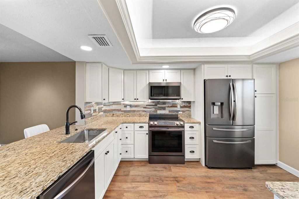 Interior, Kitchen, Recessed Lighting, Stainless Steel Appliances, Wood Texture Flooring