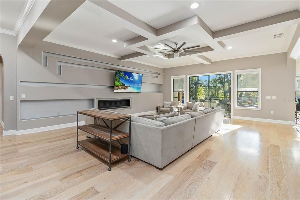 Fireplace, Interior, Living room, Recessed Lighting, Wood Texture Flooring