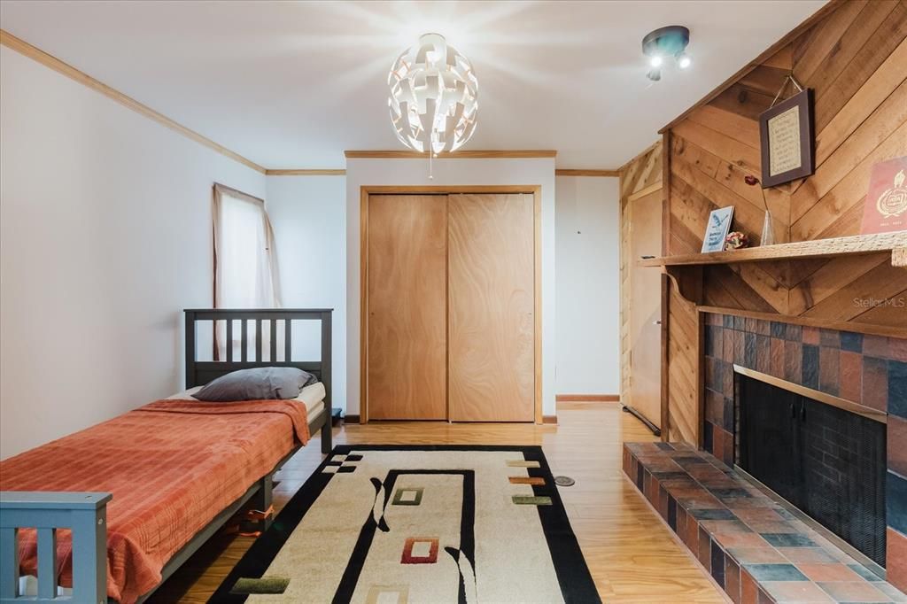 Bedroom, Fireplace, Interior, Wood Texture Flooring, Wooden Walls
