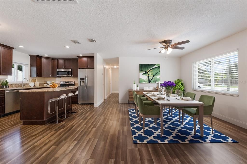 Dining room, Interior, Kitchen, Recessed Lighting, Stainless Steel Appliances, Wood Texture Flooring