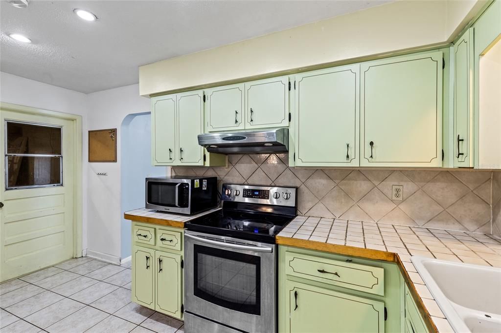 Interior, Kitchen, Recessed Lighting, Tile Countertops