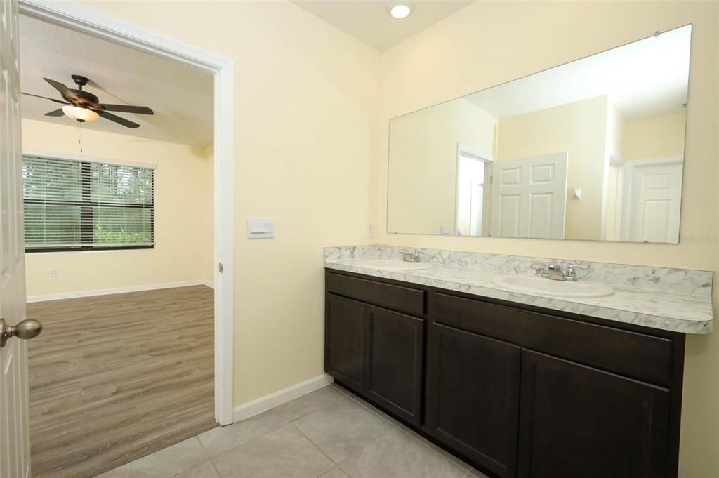 Bathroom, Dual Sink Vanities, Interior, Recessed Lighting, Wood Texture Flooring