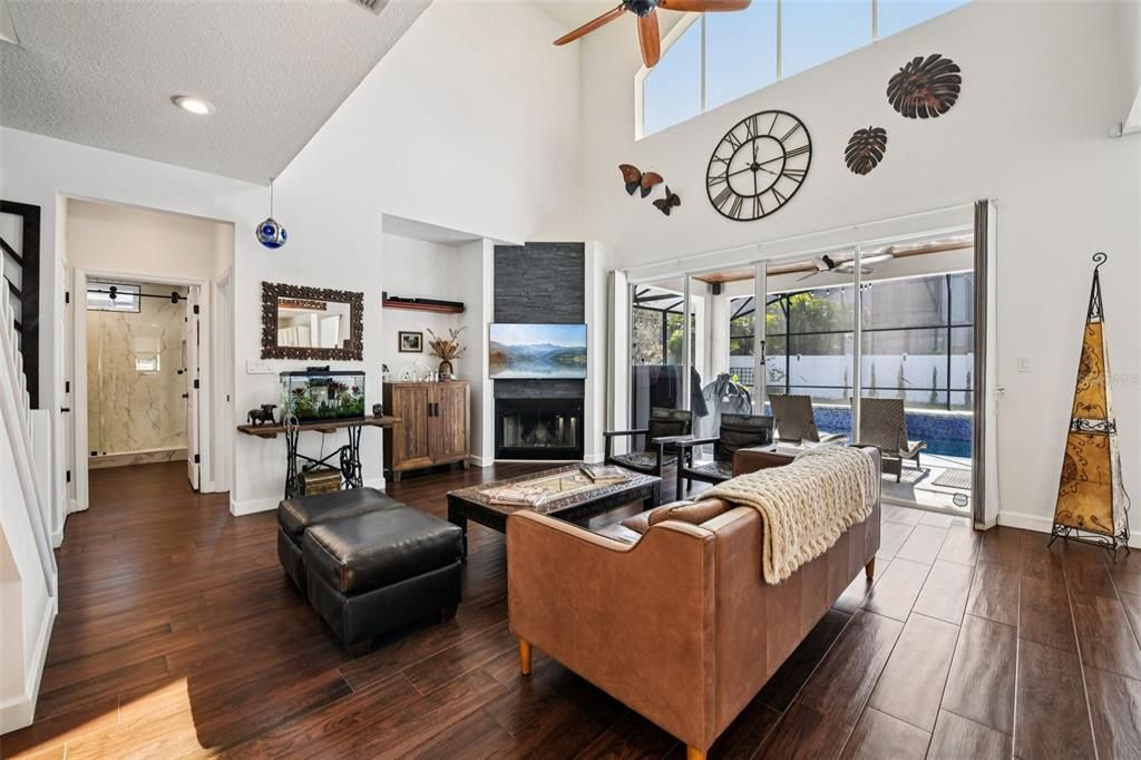 Fireplace, Interior, Living room, Recessed Lighting, Wood Texture Flooring