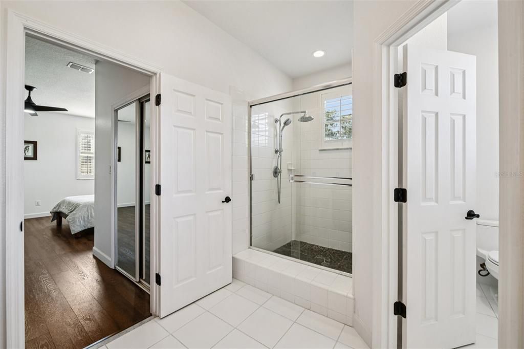 Bathroom, Bedroom, Glass Shower, Interior, Recessed Lighting, Wood Texture Flooring