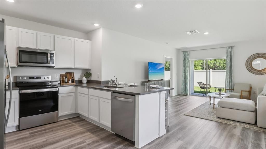 Interior, Kitchen, Recessed Lighting, Stainless Steel Appliances, Wood Texture Flooring