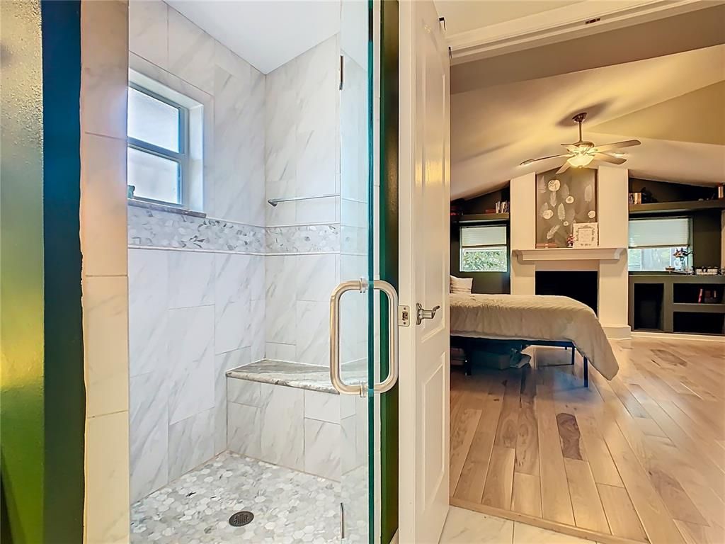 Bathroom, Bedroom, Fireplace, Glass Shower, Interior, Marble Walls, Wood Texture Flooring