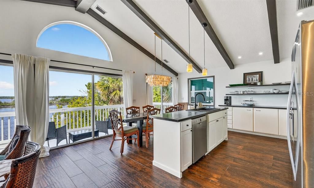 Dining room, Interior, Kitchen, Pendant Lights, Recessed Lighting, Water, Wooden Beams, Wood Texture Flooring