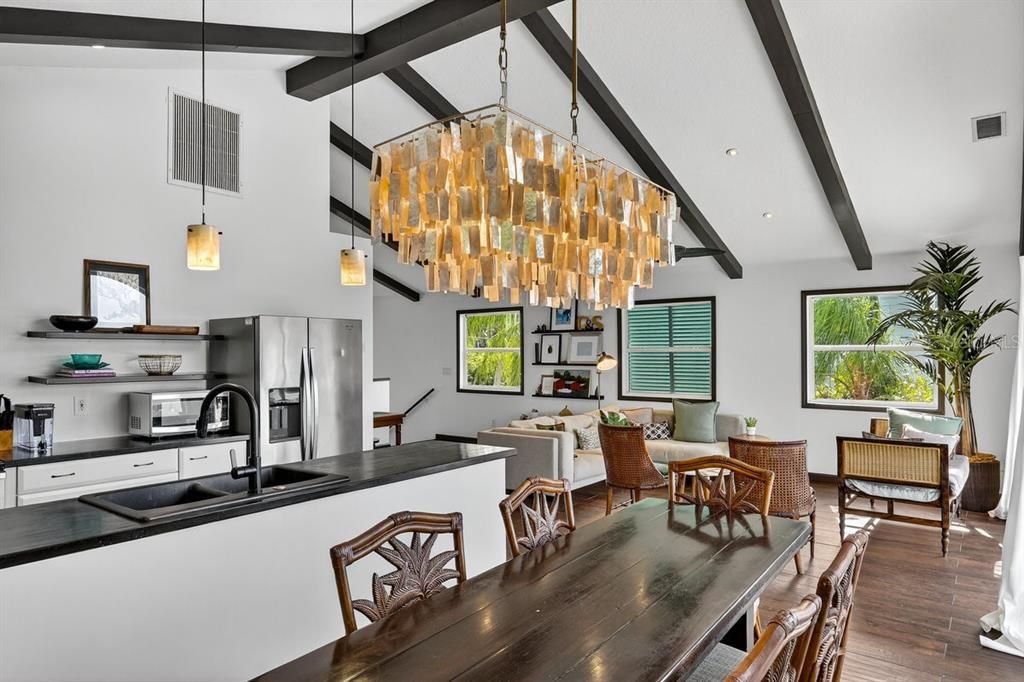 Chandelier, Dining room, Interior, Kitchen, Living room, Pendant Lights, Stainless Steel Appliances, Wooden Beams, Wood Texture Flooring