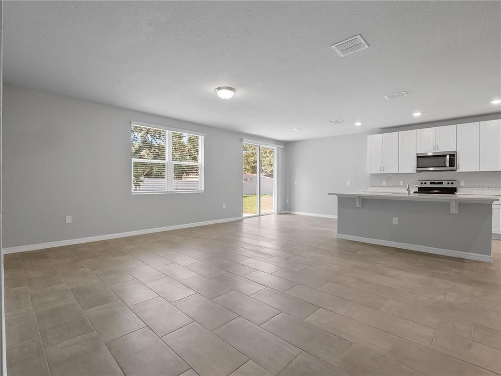 Empty room, Interior, Kitchen, Recessed Lighting, Stainless Steel Appliances