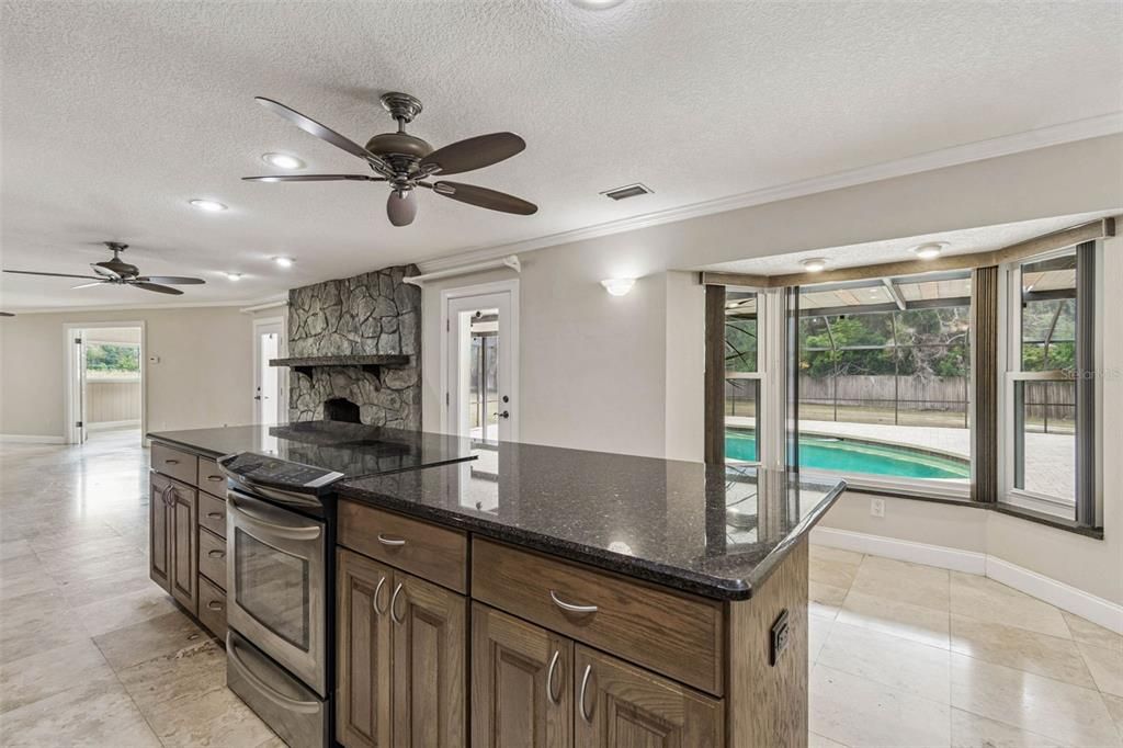 Fireplace, Interior, Kitchen, Recessed Lighting, Stone Walls