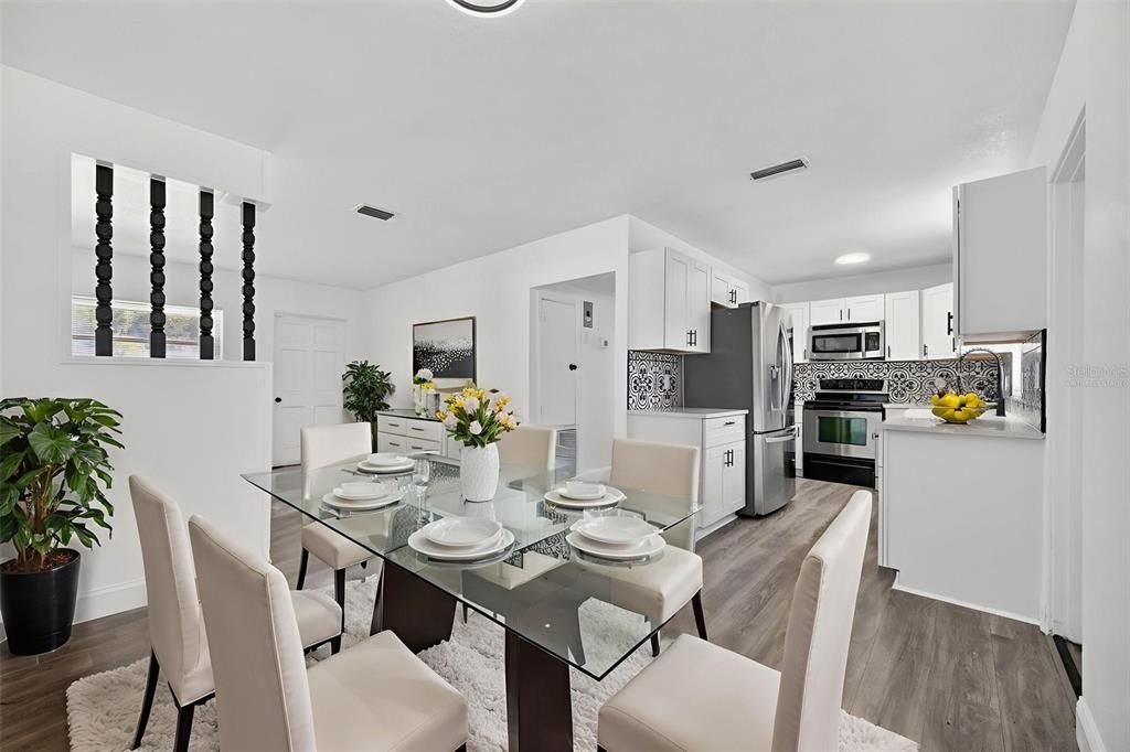 Dining room, Interior, Kitchen, Recessed Lighting, Stainless Steel Appliances, Wood Texture Flooring