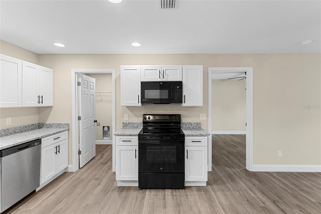 Interior, Kitchen, Recessed Lighting, Stainless Steel Appliances, Wood Texture Flooring