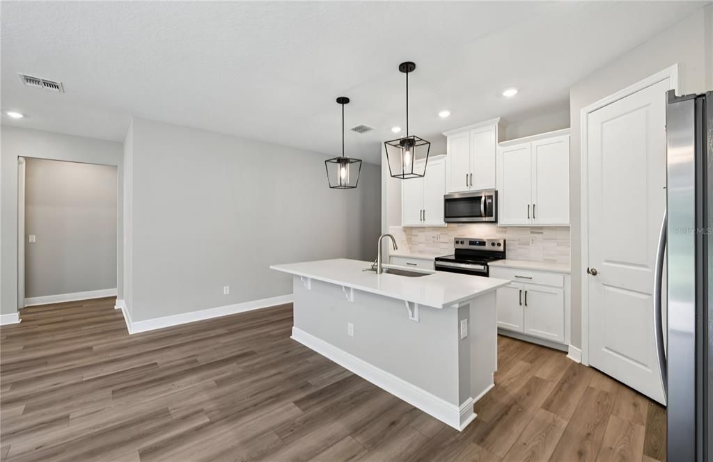 Interior, Kitchen, Pendant Lights, Recessed Lighting, Stainless Steel Appliances, Wood Texture Flooring