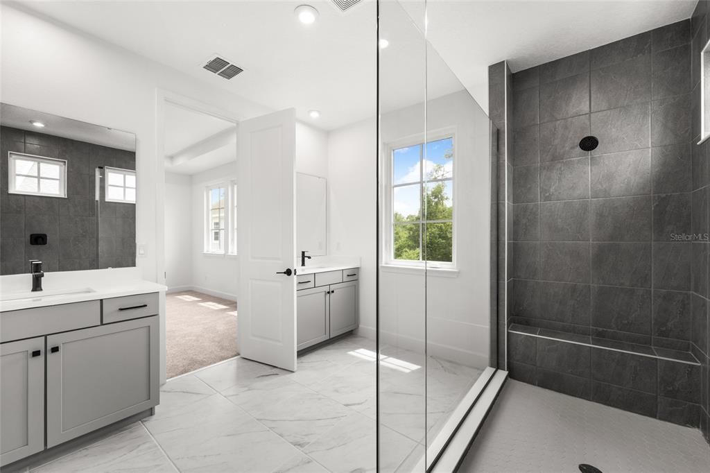 Bathroom, Dual Sink Vanities, Glass Shower, Interior, Marble, Recessed Lighting