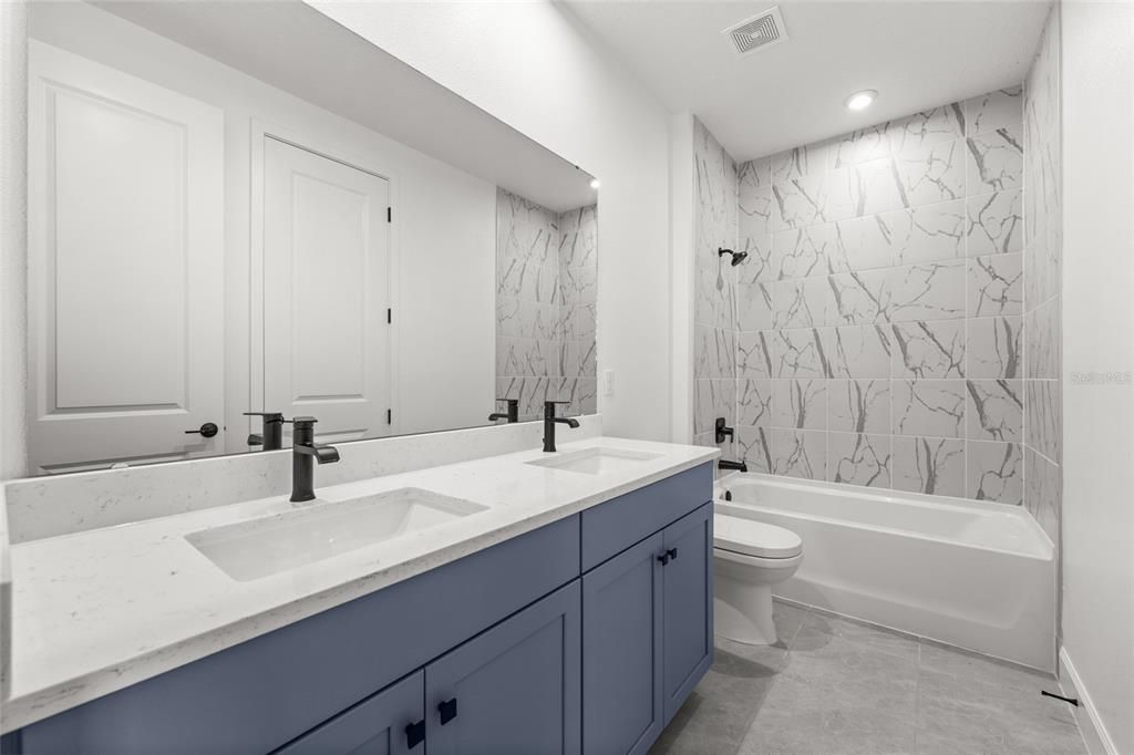 Bathroom, Dual Sink Vanities, Interior, Marble Walls, Recessed Lighting