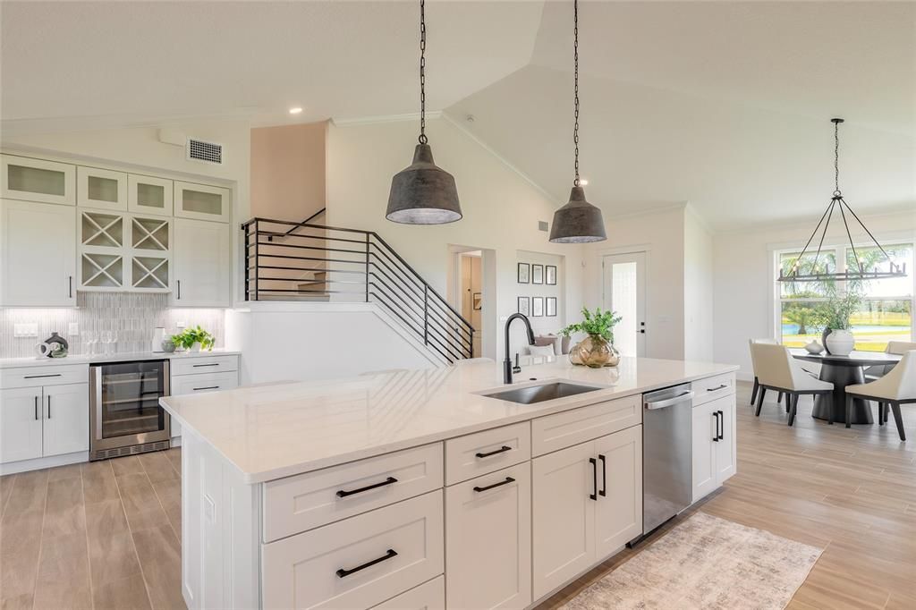 Dining room, Interior, Kitchen, Pendant Lights, Recessed Lighting, Stainless Steel Appliances, Wood Texture Flooring