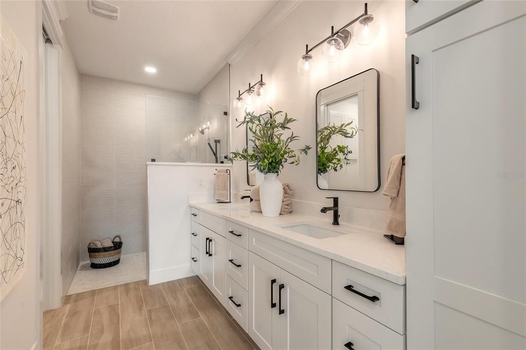 Bathroom, Dual Sink Vanities, Interior, Recessed Lighting, Wood Texture Flooring