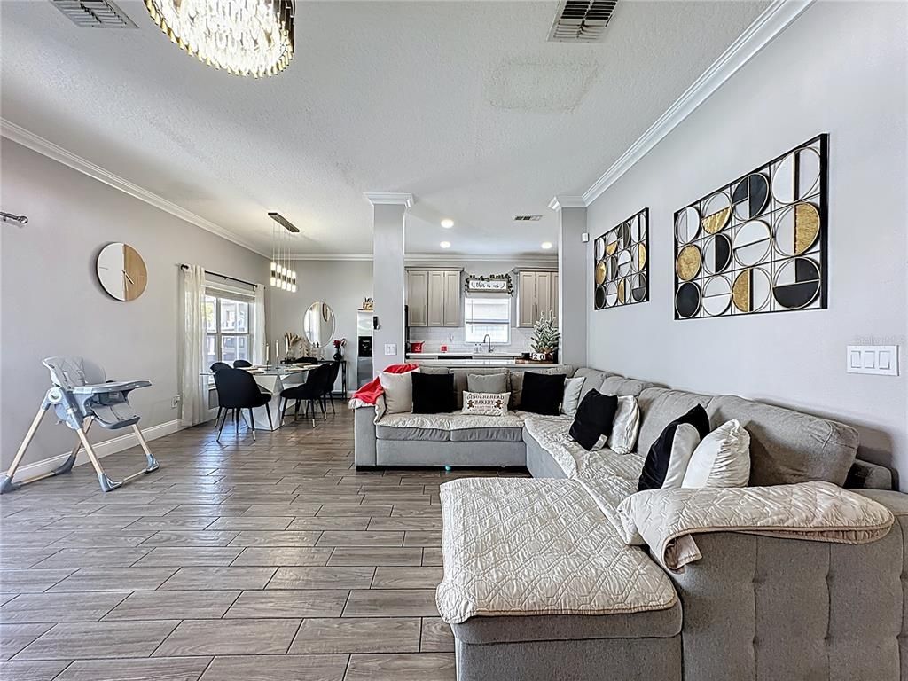 Chandelier, Dining room, Interior, Kitchen, Living room, Pendant Lights, Recessed Lighting, Wood Texture Flooring