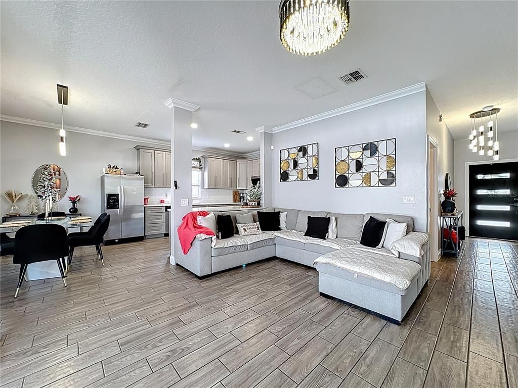 Chandelier, Dining room, Interior, Kitchen, Living room, Pendant Lights, Recessed Lighting, Wood Texture Flooring