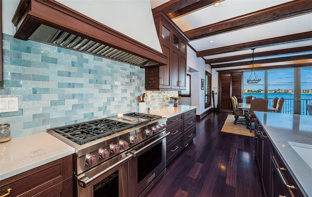 Dining room, Interior, Kitchen, Pendant Lights, Recessed Lighting, Stainless Steel Appliances, Water, Wooden Beams, Wood Texture Flooring