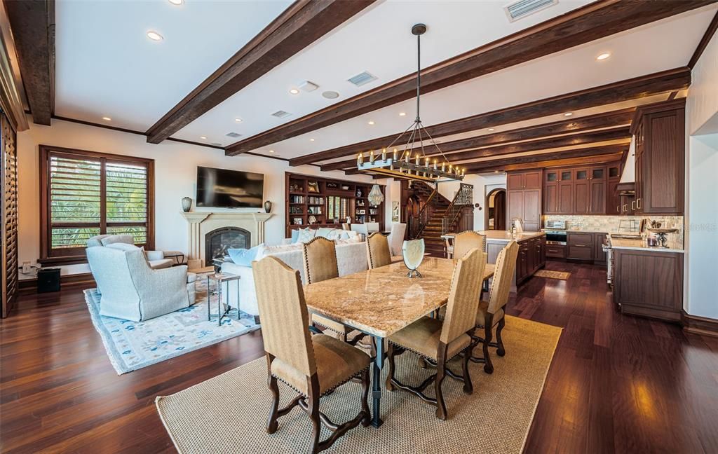 Chandelier, Dining room, Fireplace, Interior, Kitchen, Living room, Pendant Lights, Recessed Lighting, Wooden Beams, Wood Texture Flooring