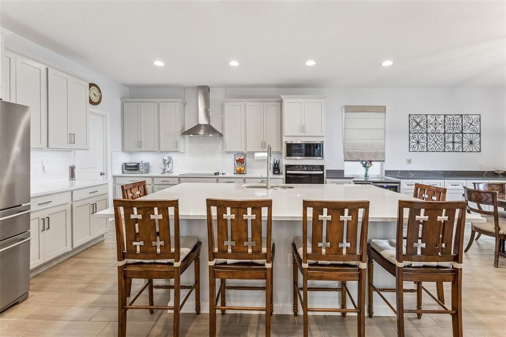 Dining room, Interior, Kitchen, Recessed Lighting, Stainless Steel Appliances, Wood Texture Flooring