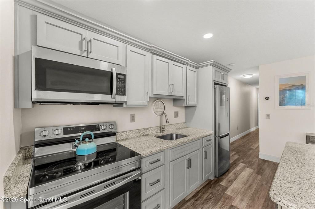 Interior, Kitchen, Recessed Lighting, Stainless Steel Appliances, Wood Texture Flooring