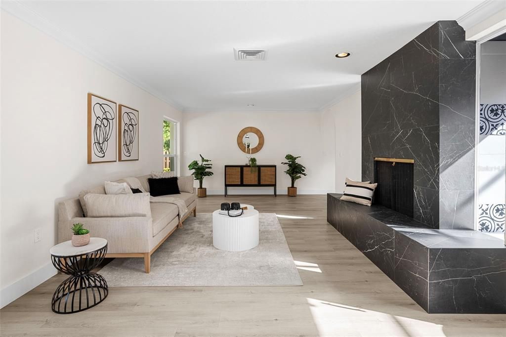 Fireplace, Interior, Living room, Marble Walls, Recessed Lighting, Wood Texture Flooring