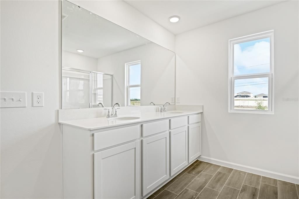 Bathroom, Dual Sink Vanities, Interior, Recessed Lighting, Wood Texture Flooring