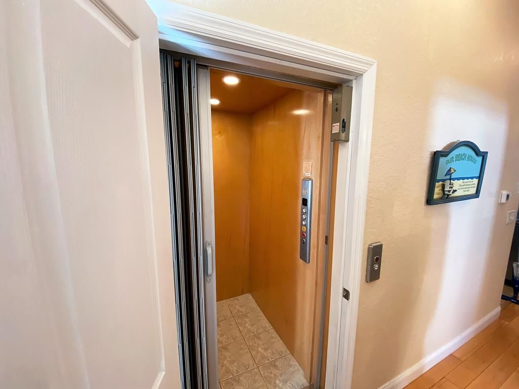 Elevator, Interior, Recessed Lighting, Wooden Ceilings, Wooden Walls