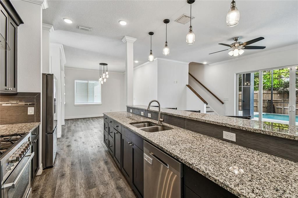 Interior, Kitchen, Pendant Lights, Recessed Lighting, Stainless Steel Appliances, Wood Texture Flooring