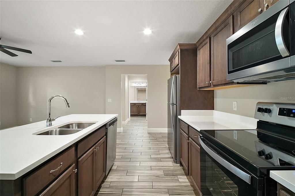 Interior, Kitchen, Recessed Lighting, Stainless Steel Appliances, Wood Texture Flooring