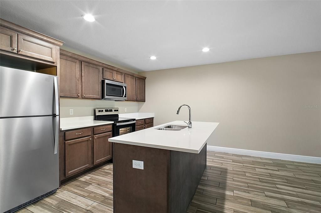 Interior, Kitchen, Recessed Lighting, Stainless Steel Appliances, Wood Texture Flooring