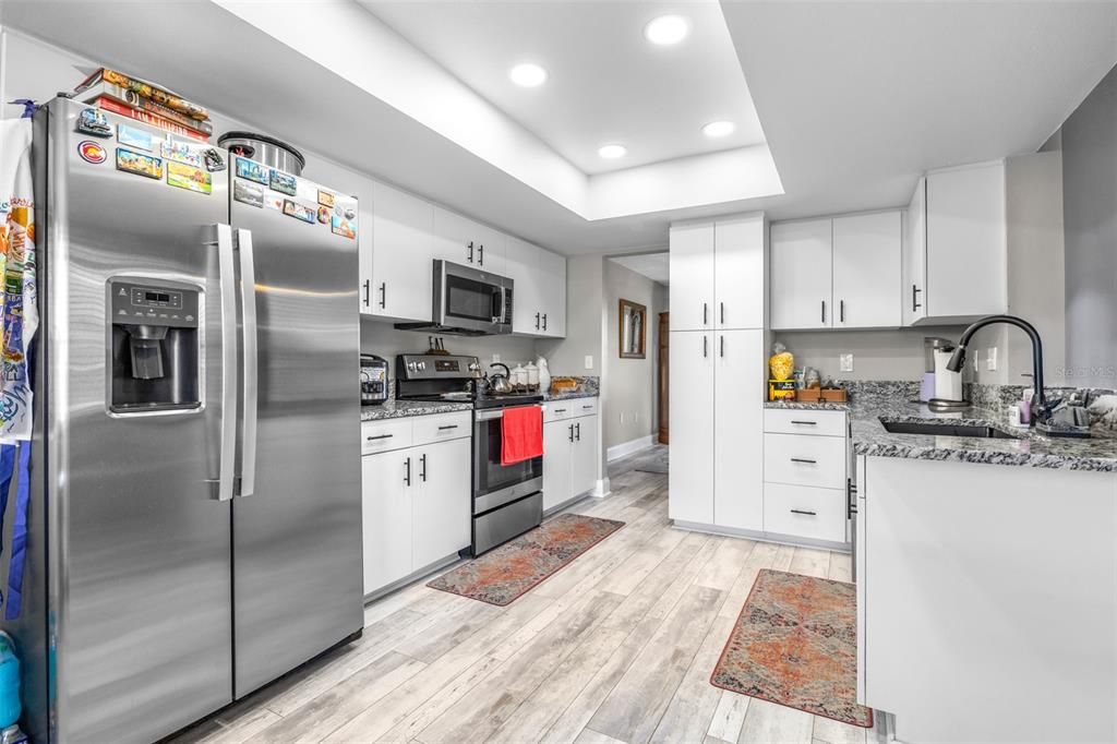 Interior, Kitchen, Recessed Lighting, Stainless Steel Appliances, Wood Texture Flooring