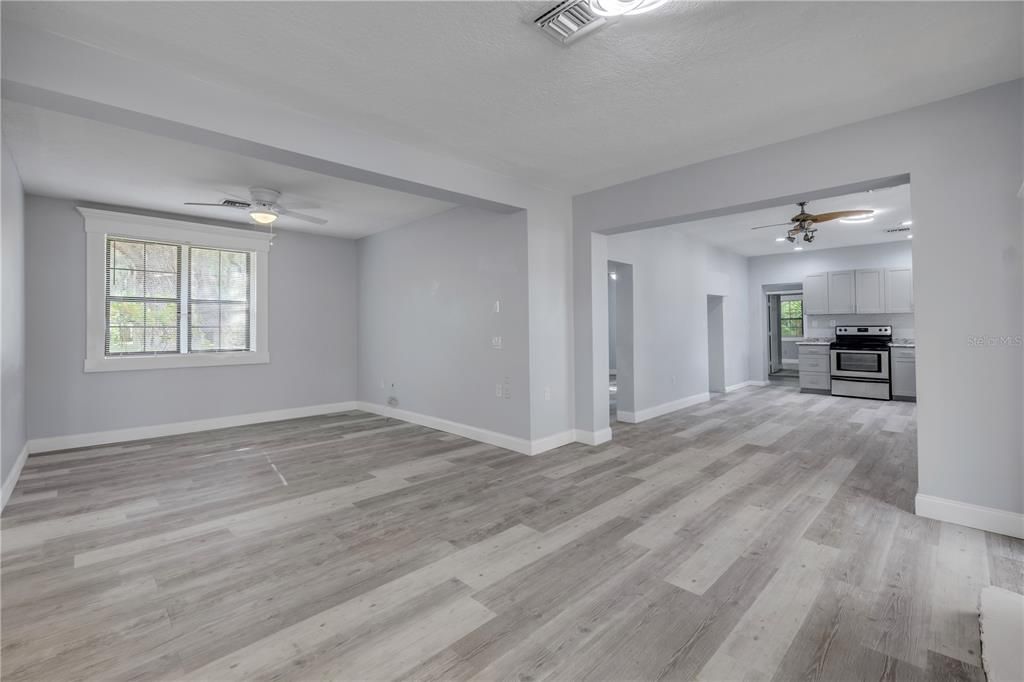 Empty room, Interior, Kitchen, Stainless Steel Appliances, Wood Texture Flooring