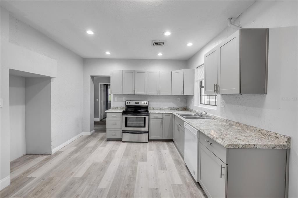 Interior, Kitchen, Recessed Lighting, Stainless Steel Appliances, Wood Texture Flooring