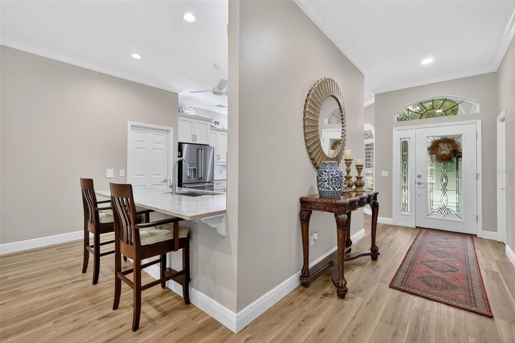 Dining room, Interior, Kitchen, Recessed Lighting, Stainless Steel Appliances, Wood Texture Flooring
