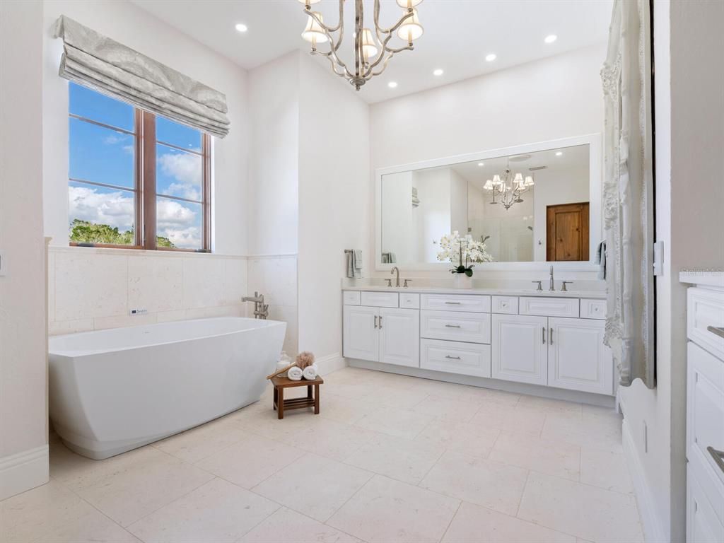 Bathroom, Chandelier, Dual Sink Vanities, Free Standing Baths, Interior, Recessed Lighting