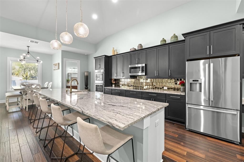 Dining room, Interior, Kitchen, Pendant Lights, Recessed Lighting, Stainless Steel Appliances, Wood Texture Flooring