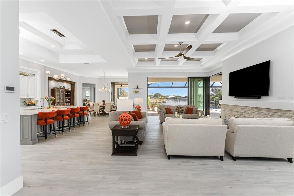 Chandelier, Dining room, Interior, Living room, Pendant Lights, Recessed Lighting, Water, Wood Texture Flooring