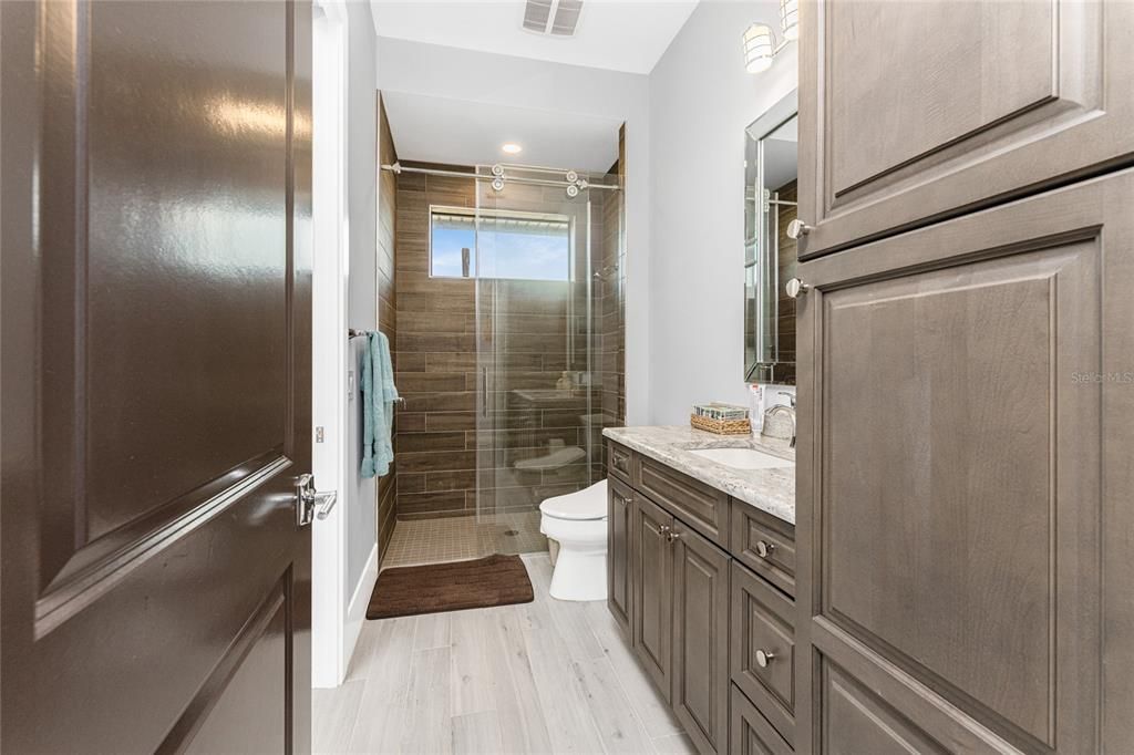 Bathroom, Glass Shower, Interior, Recessed Lighting, Wood Texture Flooring