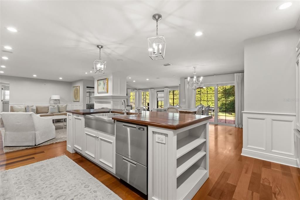 Chandelier, Fireplace, Interior, Kitchen, Living room, Pendant Lights, Recessed Lighting, Wood Texture Flooring