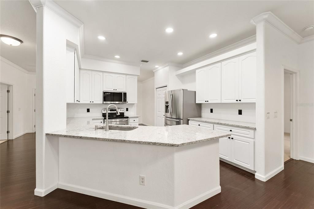 Interior, Kitchen, Recessed Lighting, Stainless Steel Appliances, Wood Texture Flooring