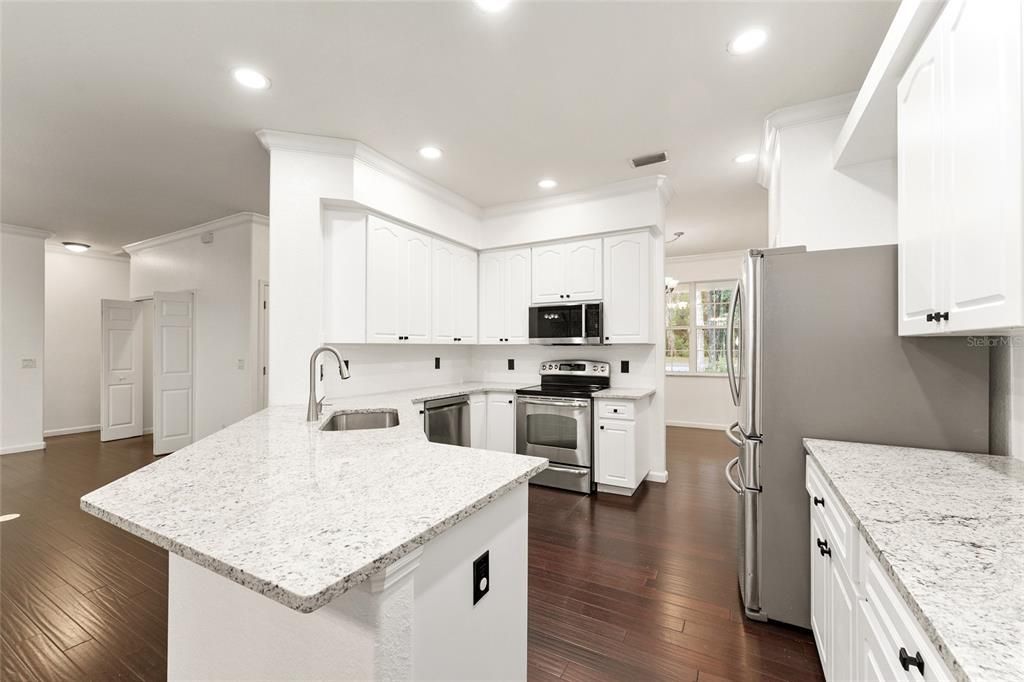 Interior, Kitchen, Recessed Lighting, Stainless Steel Appliances, Wood Texture Flooring