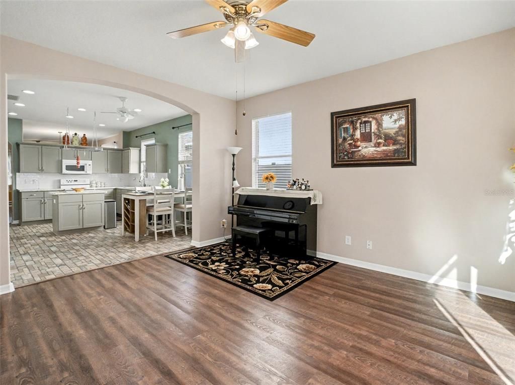 Dining room, Interior, Kitchen, Pendant Lights, Piano, Recessed Lighting, Wood Texture Flooring
