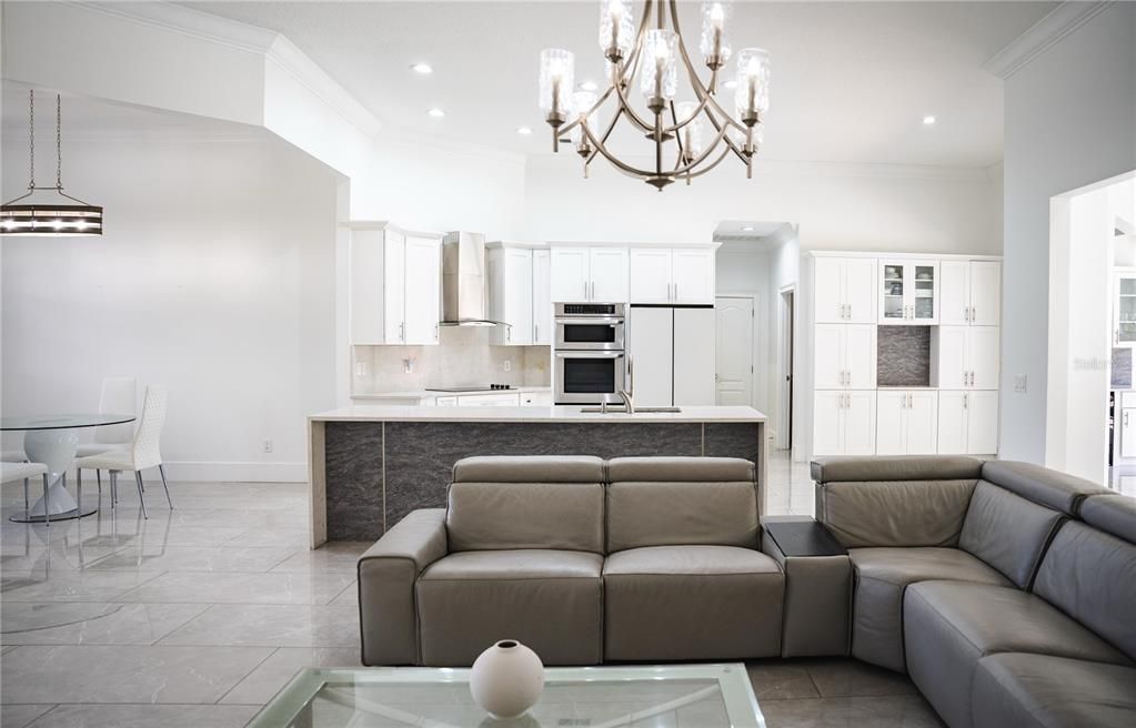 Chandelier, Dining room, Interior, Kitchen, Living room, Pendant Lights, Recessed Lighting, Stainless Steel Appliances