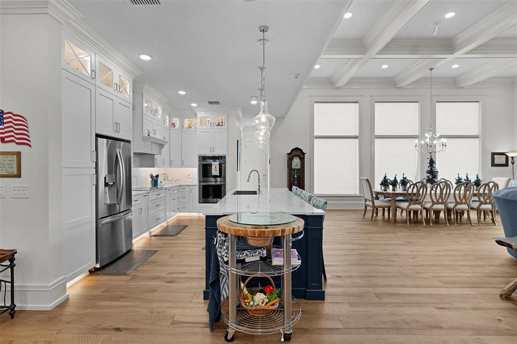 Chandelier, Dining room, Interior, Kitchen, Pendant Lights, Recessed Lighting, Stainless Steel Appliances, Wood Texture Flooring