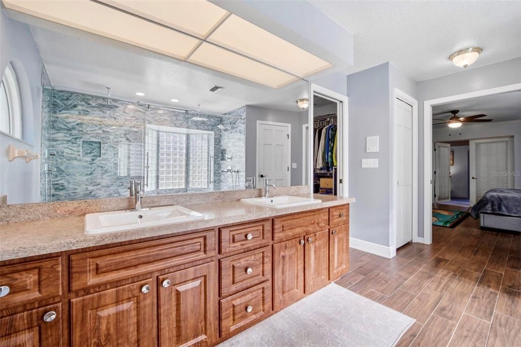 Bathroom, Dual Sink Vanities, Interior, Recessed Lighting, Wood Texture Flooring